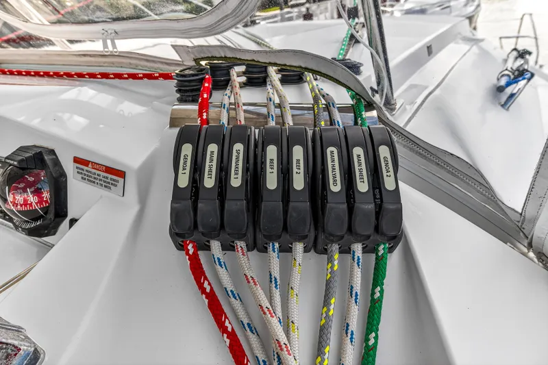Slide: The Image of Sailing controls on a 2020 Leopard 40 catamaran, featuring labeled rope clutches. - 33