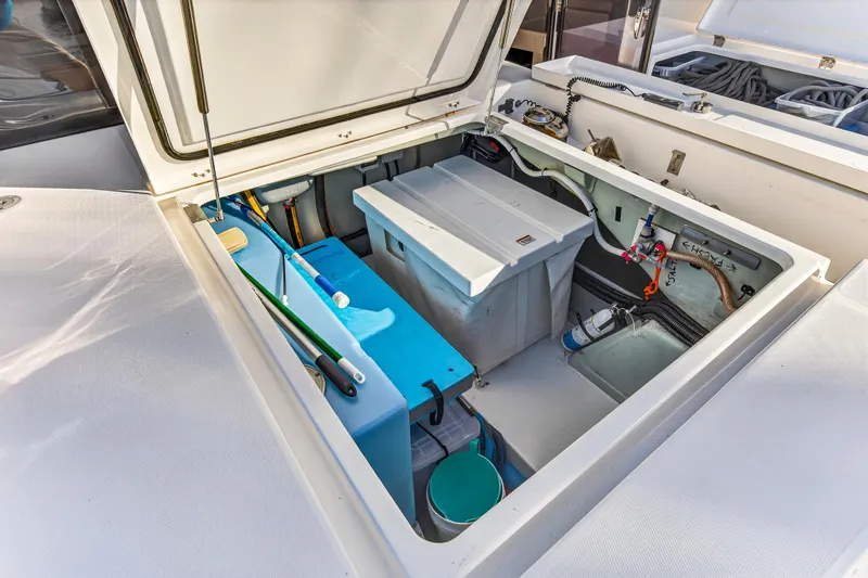 Slide: The Image of Open storage compartment on a 2020 Leopard 40 catamaran, featuring organized equipment and supplies. - 43