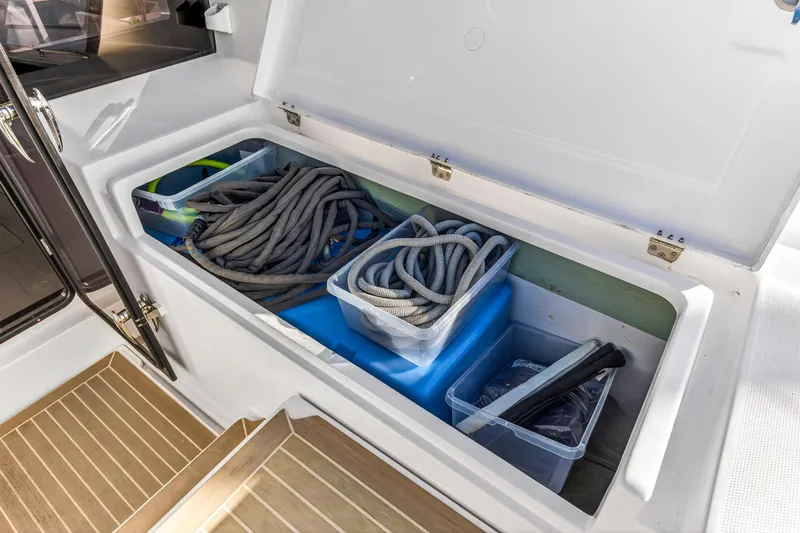Slide: The Image of Storage compartment on 2020 Leopard 40 boat with ropes and equipment. - 44