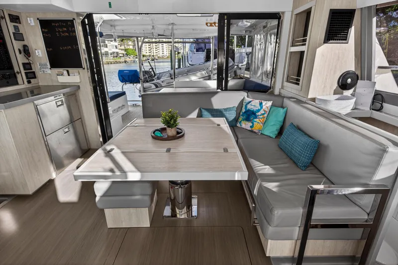 Slide: The Image of Modern interior of 2020 Leopard 40 catamaran with cozy seating and dining area. - 61
