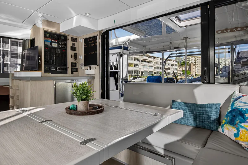 Slide: The Image of Modern interior of 2020 Leopard 40 catamaran with dining area and control panel. - 62