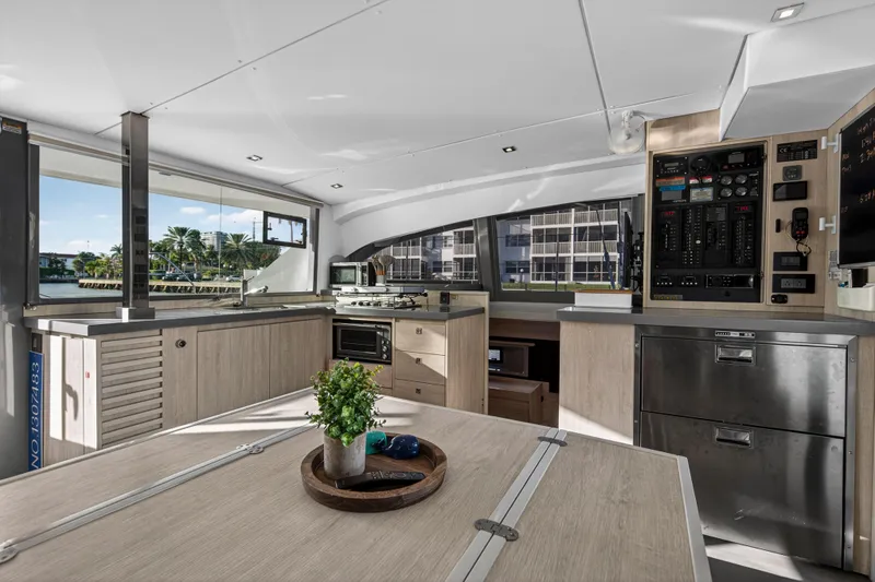 Slide: The Image of Modern interior of 2020 Leopard 40 yacht with kitchen and control panel. - 63