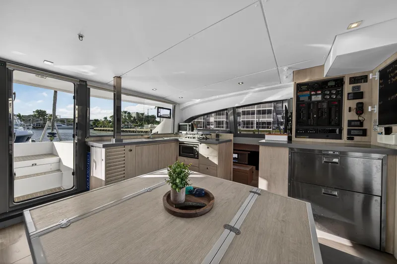 Slide: The Image of Modern interior of 2020 Leopard 40 yacht with kitchen and control panel. - 64