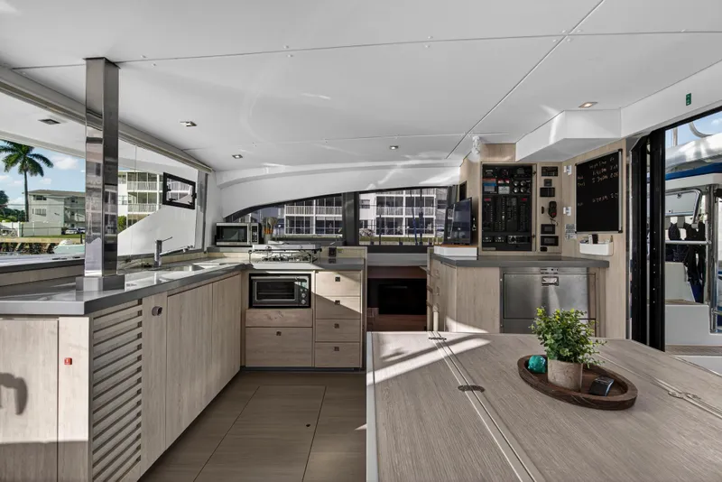 Slide: The Image of Modern interior of 2020 Leopard 40 catamaran with sleek kitchen and dining area. - 65