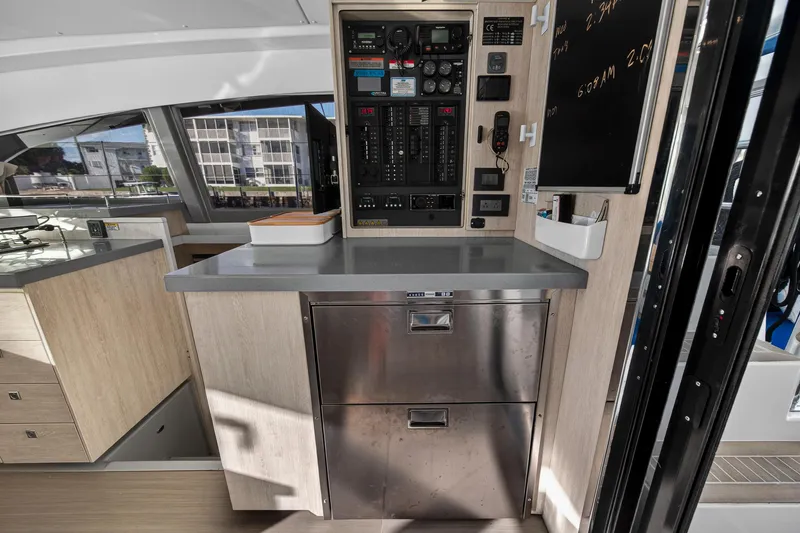 Slide: The Image of Interior of 2020 Leopard 40 yacht with control panel and storage drawers. - 70
