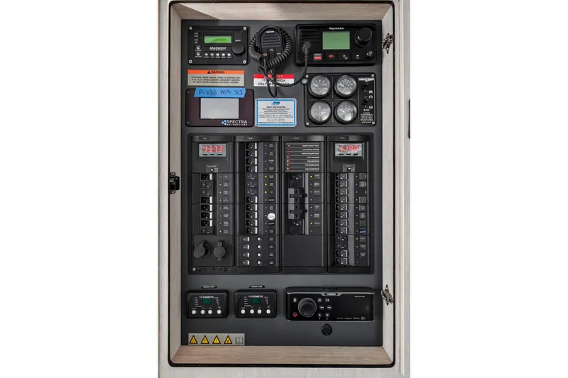 Slide: The Image of Electrical control panel of a 2020 Leopard 40 catamaran with various instruments and gauges. - 71