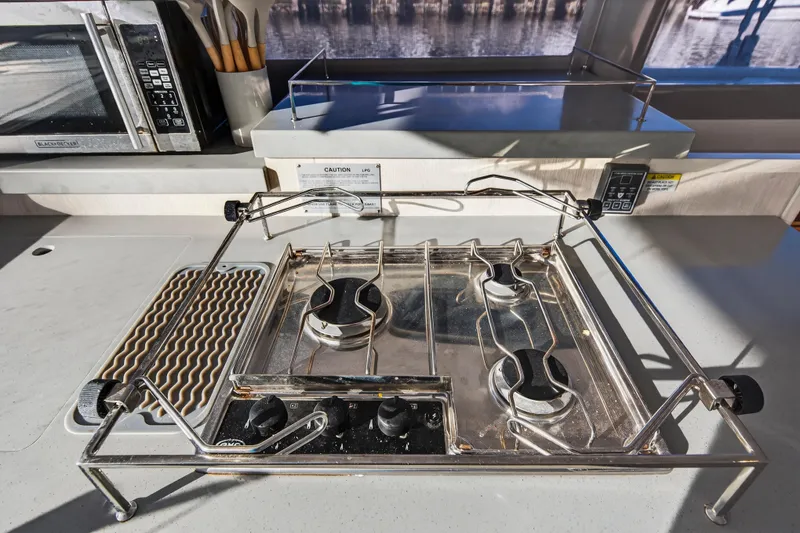 Slide: The Image of Modern kitchen stove on 2020 Leopard 40 yacht with stainless steel finish. - 75