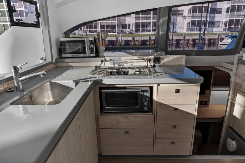 Slide: The Image of Modern kitchen interior of 2020 Leopard 40 catamaran with appliances and sleek design. - 77