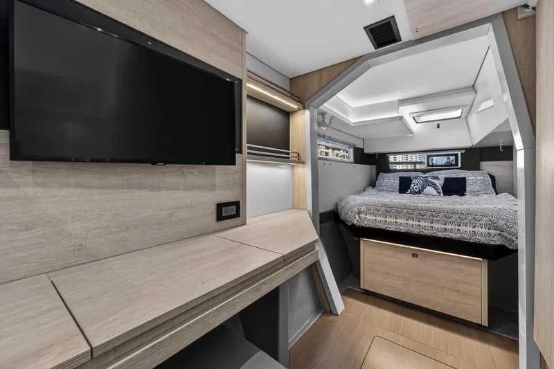 Slide: The Image of Luxurious interior of 2020 Leopard 40 yacht with modern bedroom and TV. - 81