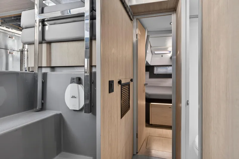 Slide: The Image of Modern interior of 2020 Leopard 40 yacht, featuring sleek wood finishes and compact design. - 95