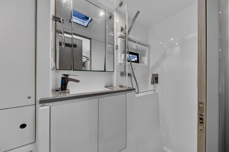 Slide: The Image of Modern bathroom interior of 2020 Leopard 40 yacht with sleek fixtures and mirrored cabinets. - 97
