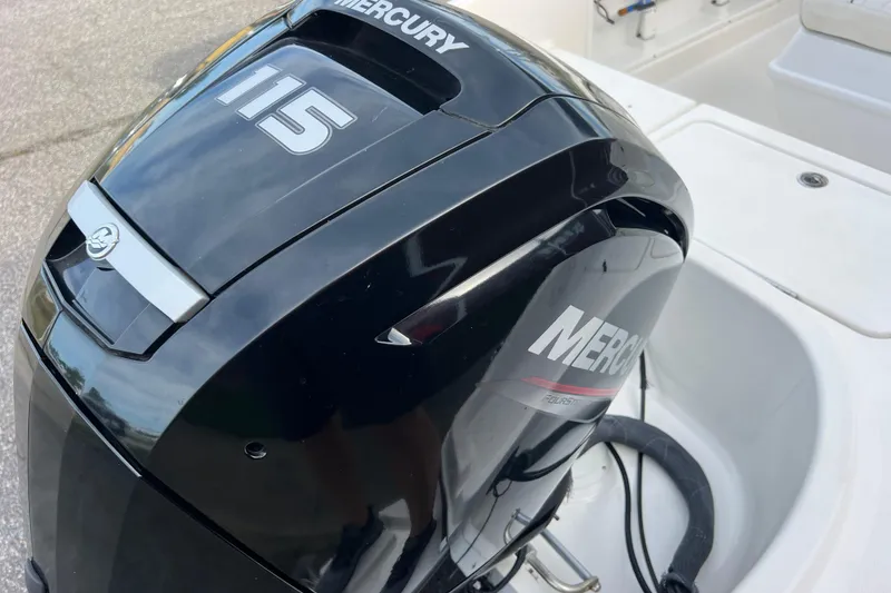 Slide: The Image of 2020 Bayliner Element F18 with Mercury 115 outboard engine, close-up view. - 27