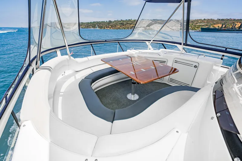 Slide: The Image of Luxurious seating area on 2001 Sea Ray 560 Sedan Bridge yacht with ocean view. - 39