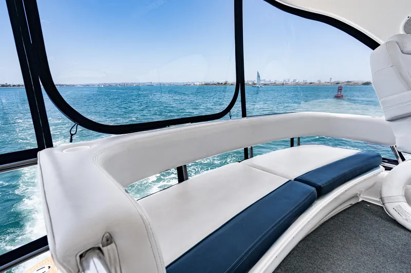 Slide: The Image of Luxurious interior of 2001 Sea Ray 560 Sedan Bridge yacht with ocean view. - 40