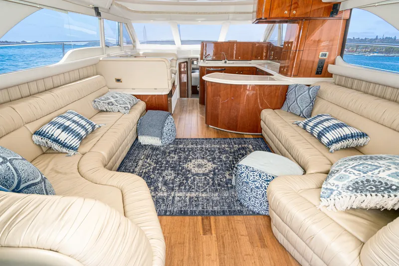 Slide: The Image of Luxurious interior of 2001 Sea Ray 560 Sedan Bridge yacht with plush seating and elegant decor. - 43
