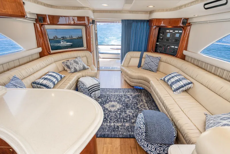 Slide: The Image of Luxurious interior of 2001 Sea Ray 560 Sedan Bridge yacht with elegant seating and decor. - 44