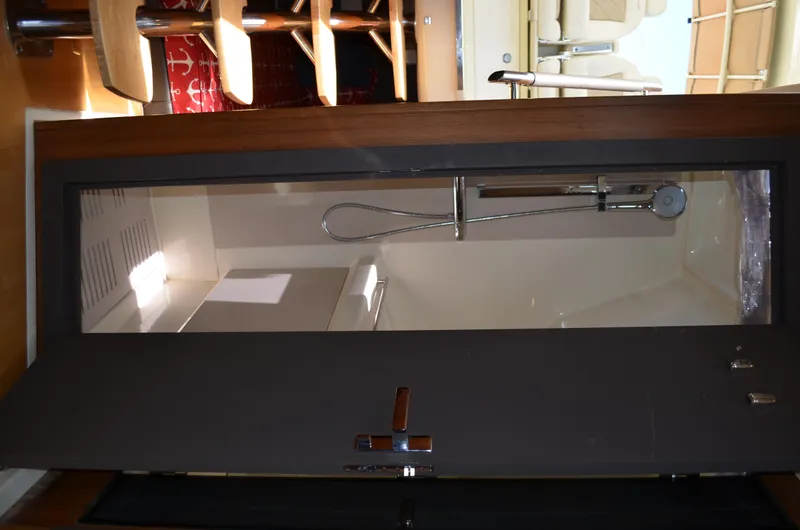 Slide: The Image of 2016 Chris-Craft Launch 36 interior shower area with modern fixtures. - 14