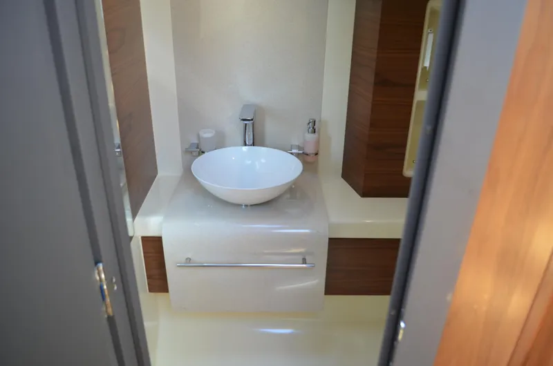 Slide: The Image of 2016 Chris-Craft Launch 36 bathroom with modern sink and sleek design. - 16