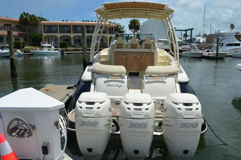 Slide: The Image of 2016 Chris-Craft Launch 36 boat with triple 300 horsepower engines docked at marina. - 20