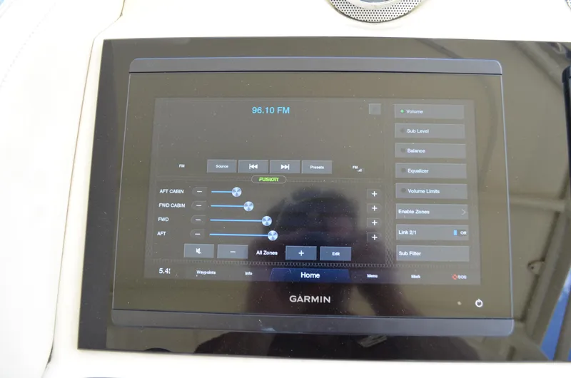 Slide: The Image of Garmin touchscreen display on 2016 Chris-Craft Launch 36 boat, showing audio controls. - 29