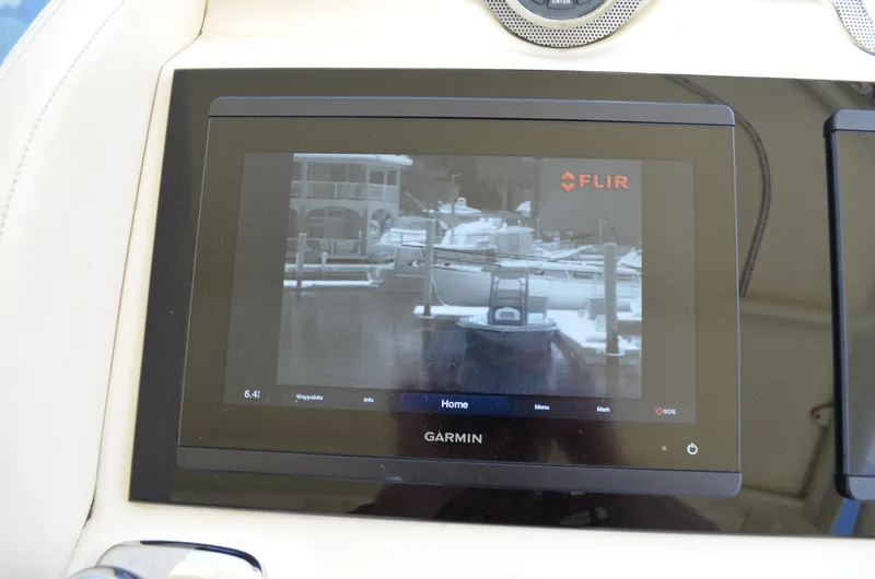 Slide: The Image of Garmin display on 2016 Chris-Craft Launch 36, showing FLIR camera view of marina. - 32
