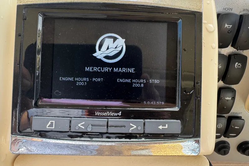 Slide: The Image of Mercury Marine VesselView4 display on 2016 Chris-Craft Launch 36, showing engine hours. - 38