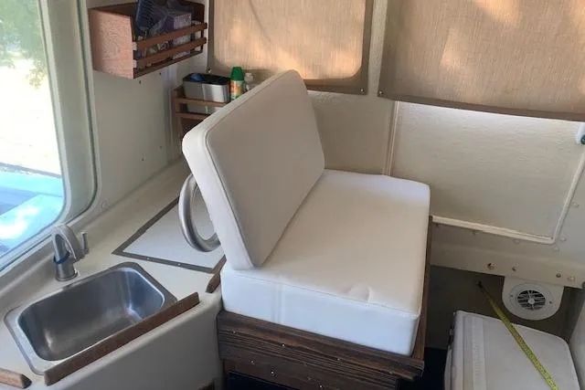 Slide: The Image of 2002 Rosborough RF-246 Custom Wheelhouse boat with enclosed cabin, docked outdoors. - 5