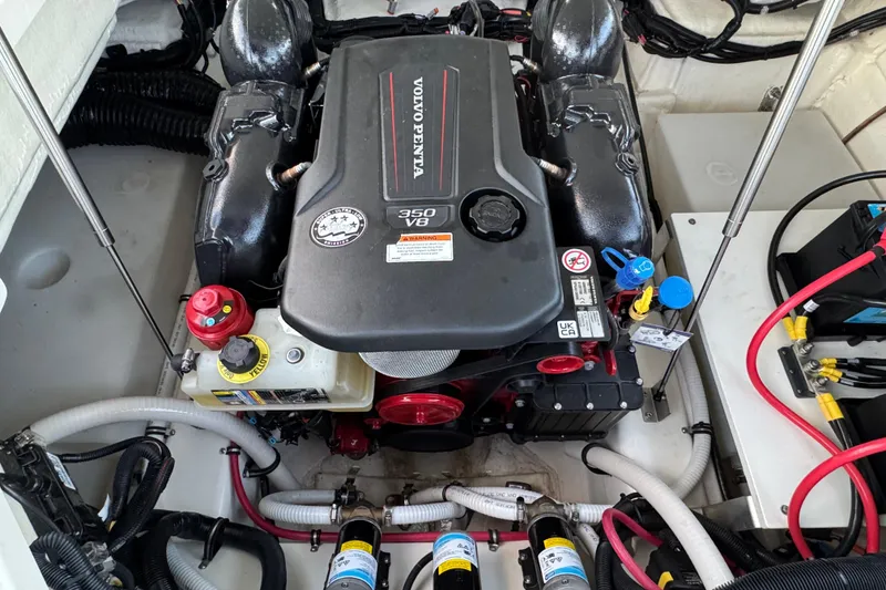 Slide: The Image of 2023 Cobalt R4 Surf engine compartment featuring a Volvo Penta 350 V8 engine. - 21