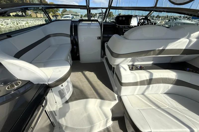 Slide: The Image of Cup holders on a 2018 Formula 37 Performance Cruiser boat interior. - 14