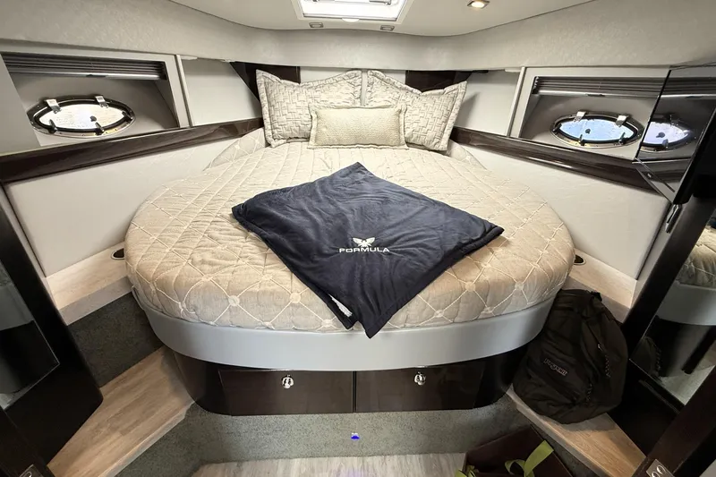 Slide: The Image of Engine compartment of a 2018 Formula 37 Performance Cruiser, showcasing dual engines and components. - 30