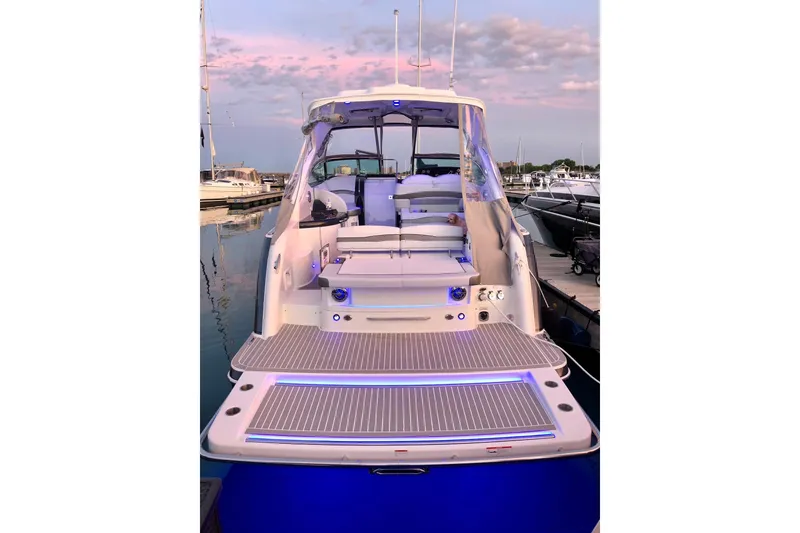 Slide: The Image of 2018 Formula 37 Performance Cruiser interior with modern kitchen and cozy seating area. - 4