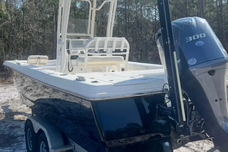Slide: The Image of 2017 Robalo 246 Cayman boat with 300 horsepower engine on trailer. - 3