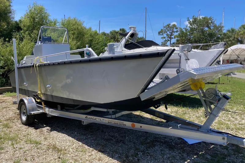 Slide: The Image of Trailer wheel of 2026 Florida Landing Craft 20, featuring Magic Tilt branding. - 9