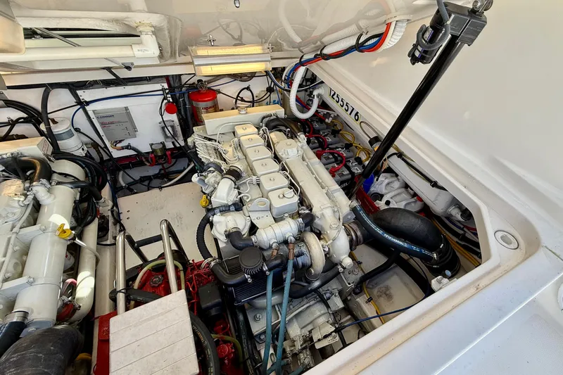 Slide: The Image of Engine compartment of a 2003 Tiara Yachts 3500 Open, showcasing detailed mechanical components. - 32