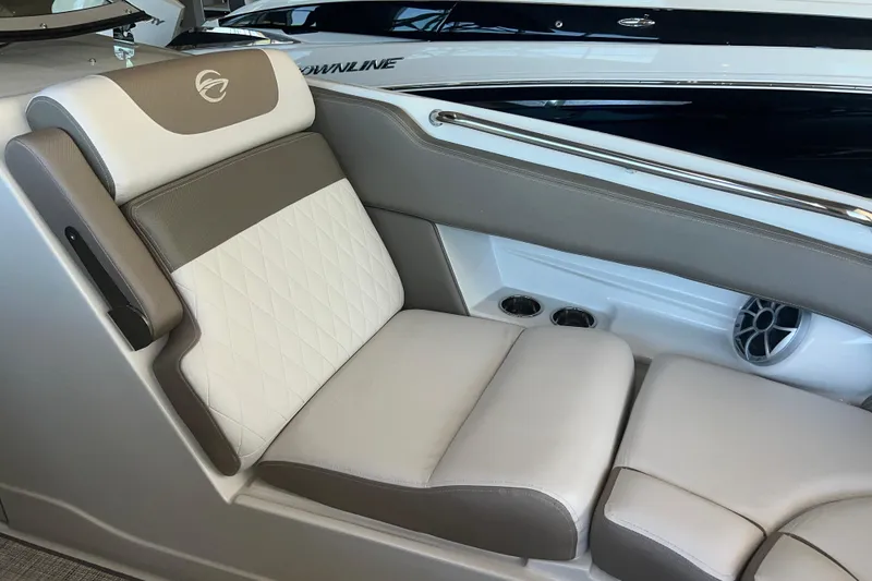 Slide: The Image of 2026 Crownline Eclipse E260 XS dashboard with Wet Sounds audio system. - 13