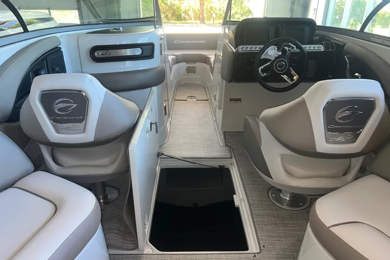 Slide: The Image of 2026 Crownline Eclipse E260 XS helm with dual Garmin displays and modern controls. - 15