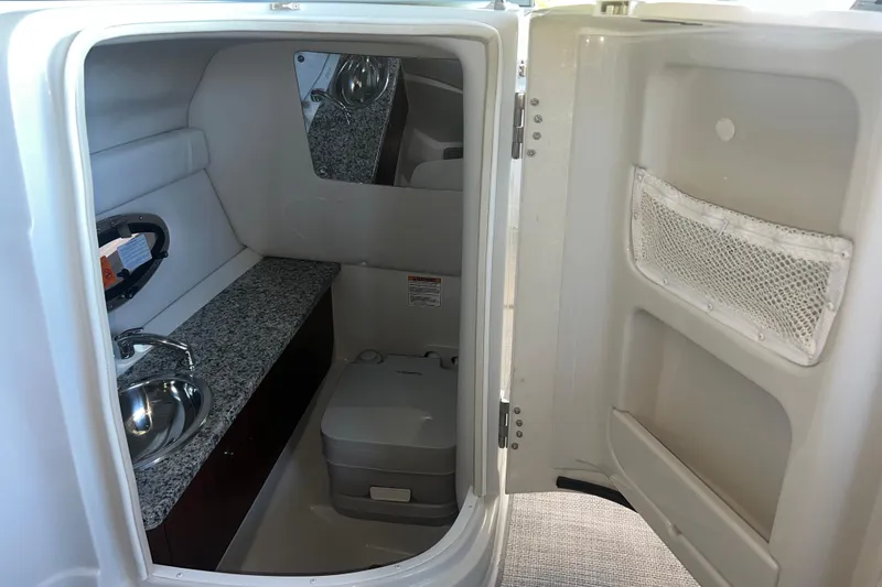 Slide: The Image of Luxurious interior of 2026 Crownline Eclipse E260 XS boat with plush seating. - 20