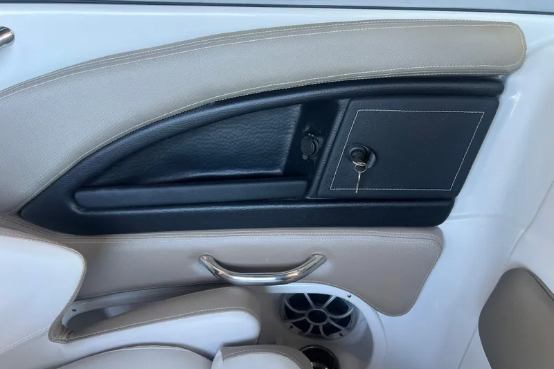 Slide: The Image of Interior of 2026 Crownline Eclipse E260 XS boat, featuring sleek seating and modern design. - 22