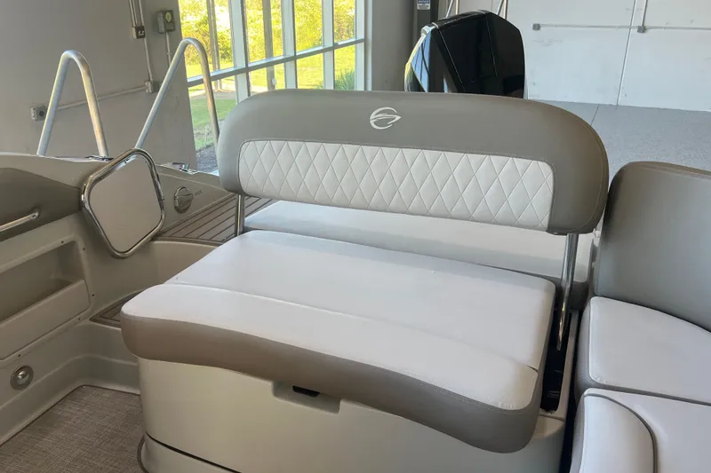 Slide: The Image of Luxurious interior of 2026 Crownline Eclipse E260 XS boat with plush seating. - 32