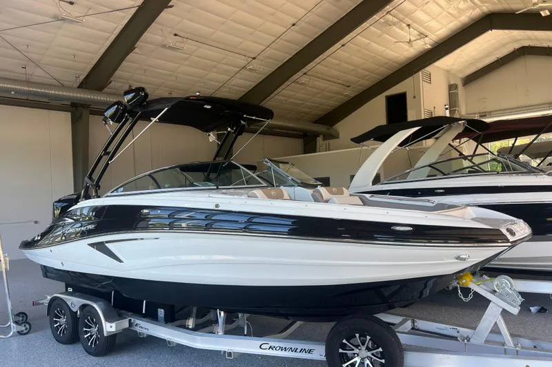 Slide: The Image of Luxurious seating area of 2026 Crownline Eclipse E260 XS boat interior. - 4