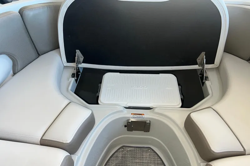 Slide: The Image of Interior of 2026 Crownline Eclipse E260 XS boat with speaker and cup holders. - 9