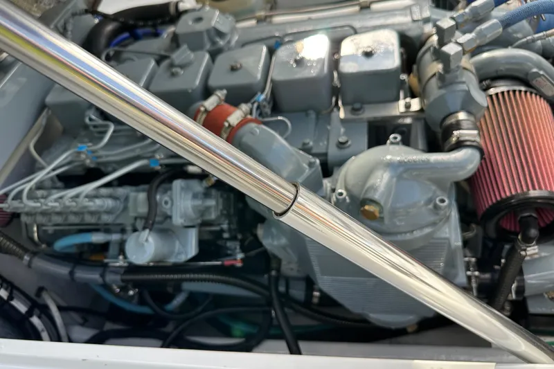 Slide: The Image of 2004 SeaVee Center Console engine with visible components and wiring. - 38