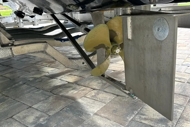 Slide: The Image of 2004 SeaVee Center Console boat propeller and rudder on a trailer. - 44