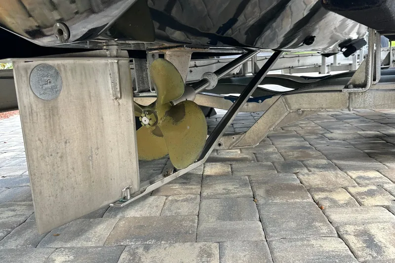 Slide: The Image of 2004 SeaVee Center Console boat propeller and rudder on a trailer. - 46