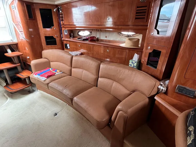 Slide: The Image of 2006 Four Winns 348 Vista boat interior with white seating and sleek design. - 10