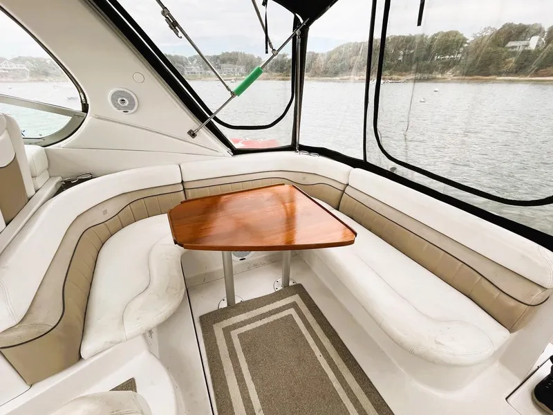 Slide: The Image of 2006 Four Winns 348 Vista yacht docked at marina, side view. - 3