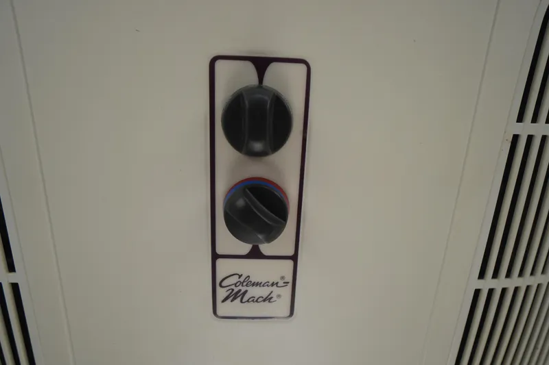 Slide: The Image of Control panel of Coleman-Mach air conditioner in 2016 Rosborough 246 Dingby boat. - 37
