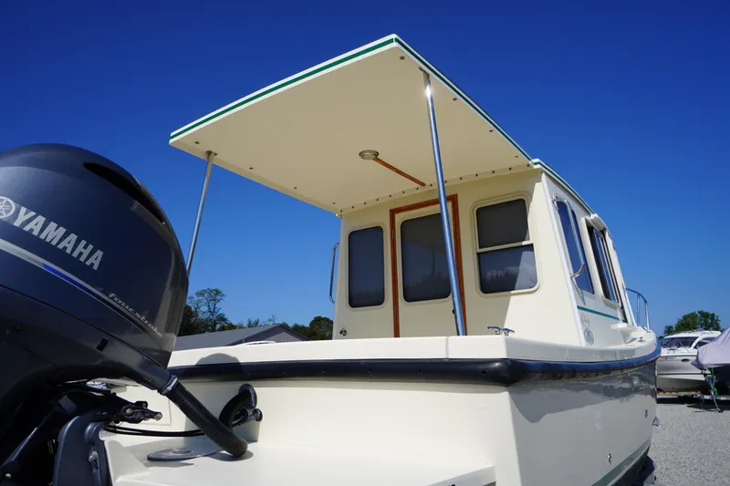 Slide: The Image of 2016 Rosborough 246 Dingby boat with Yamaha motor under clear blue sky. - 40