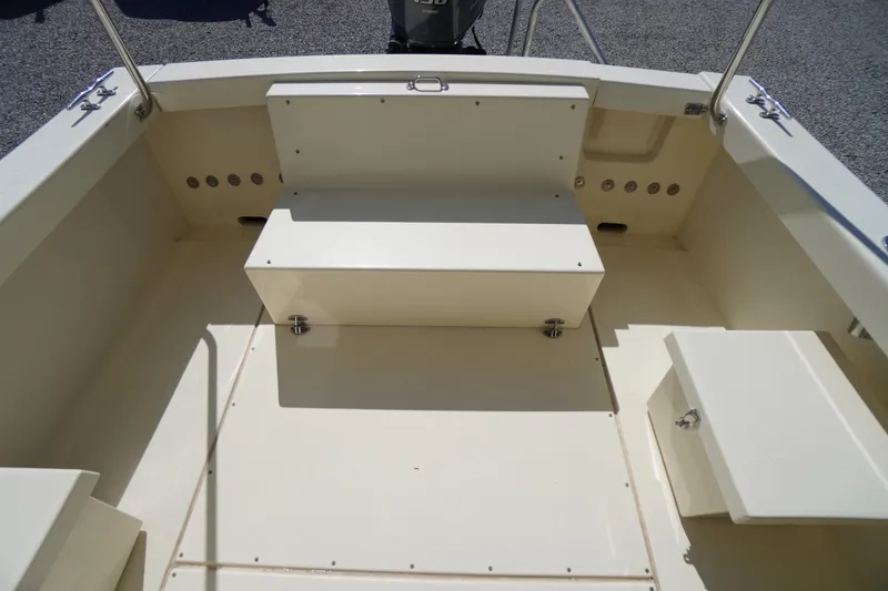Slide: The Image of 2016 Rosborough 246 Dingby boat interior with seating and storage compartments. - 43