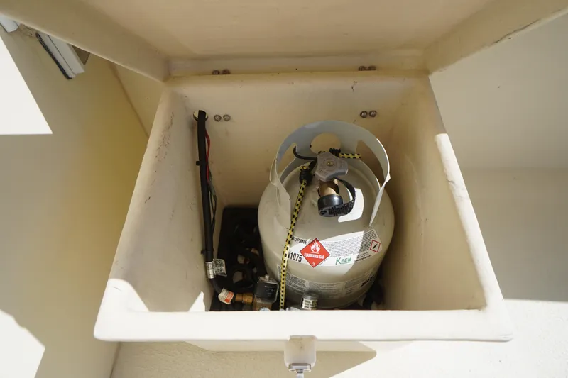 Slide: The Image of Propane tank storage compartment in 2016 Rosborough 246 Dingby boat. - 45